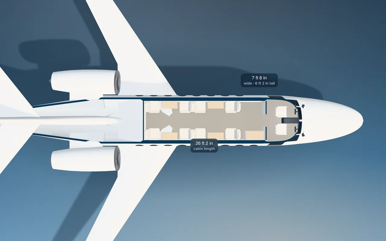 Dassault Falcon 2000 3D seat map illustration: plan view cut through the 26 ft 2 in cabin, with a representative 8-seat layout.