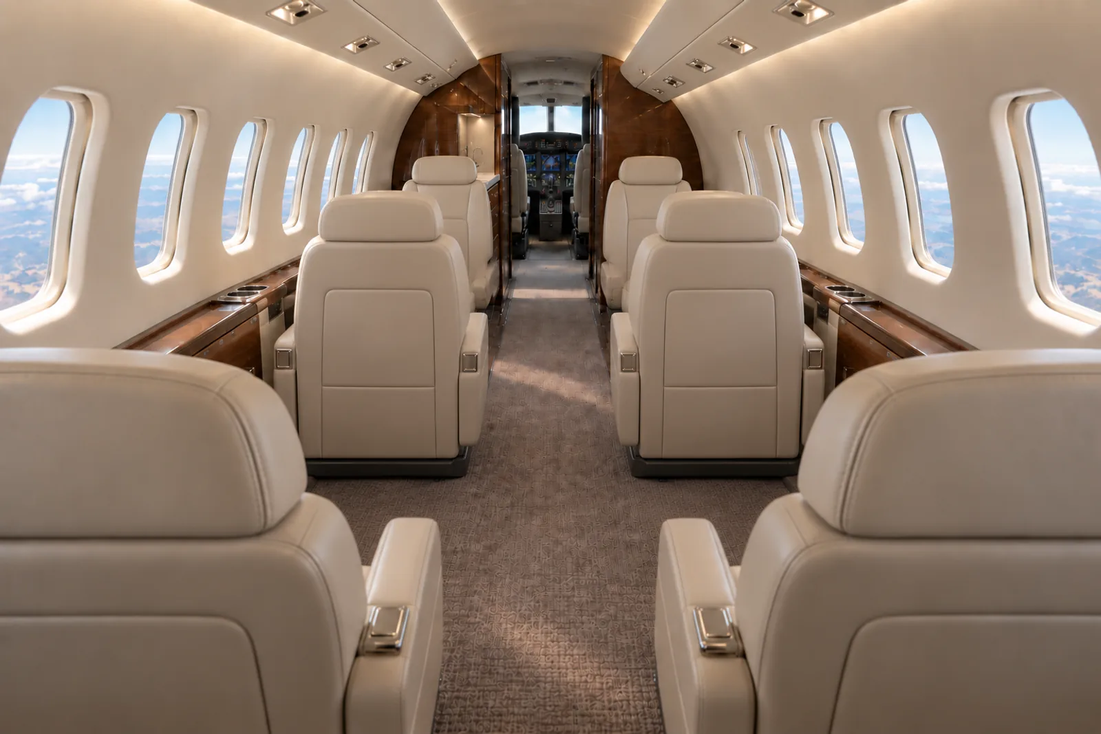 Learjet 40 cabin interior illustration: illustration of a Learjet 40 type cabin, 59 inches high and 61 inches wide, with six passenger chairs, a forward facing four-seat club and two aft chairs.