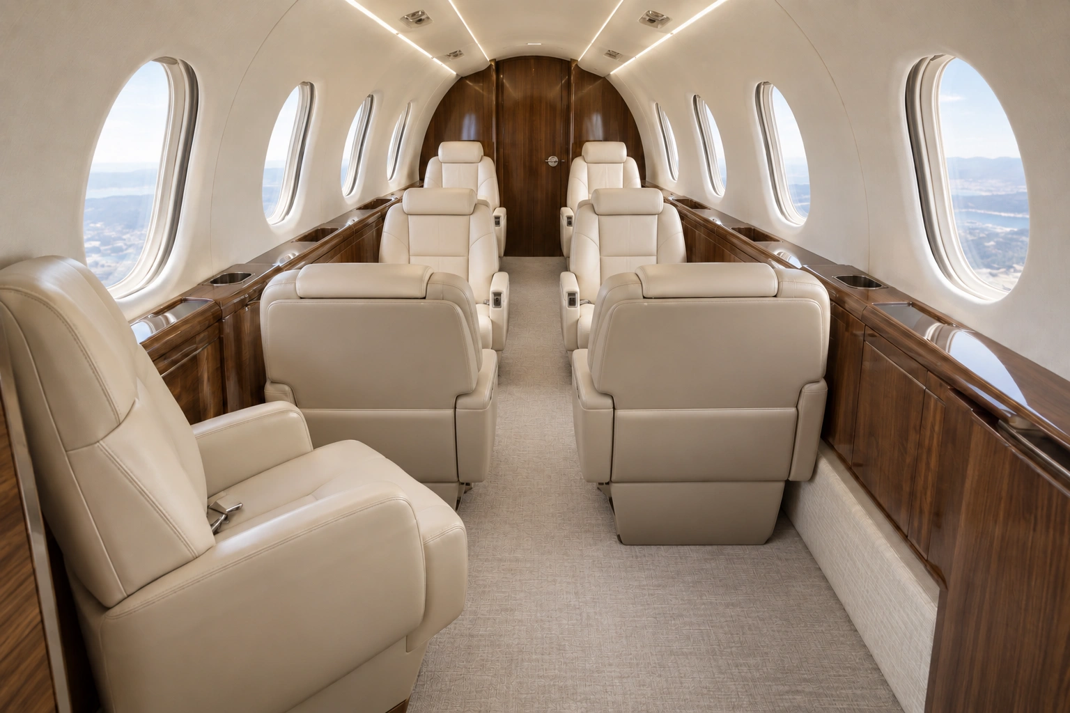 Illustrative Citation Ascend seven-seat cabin example looking aft, with a flat floor, a forward side chair, a four-chair club and an aft pair.