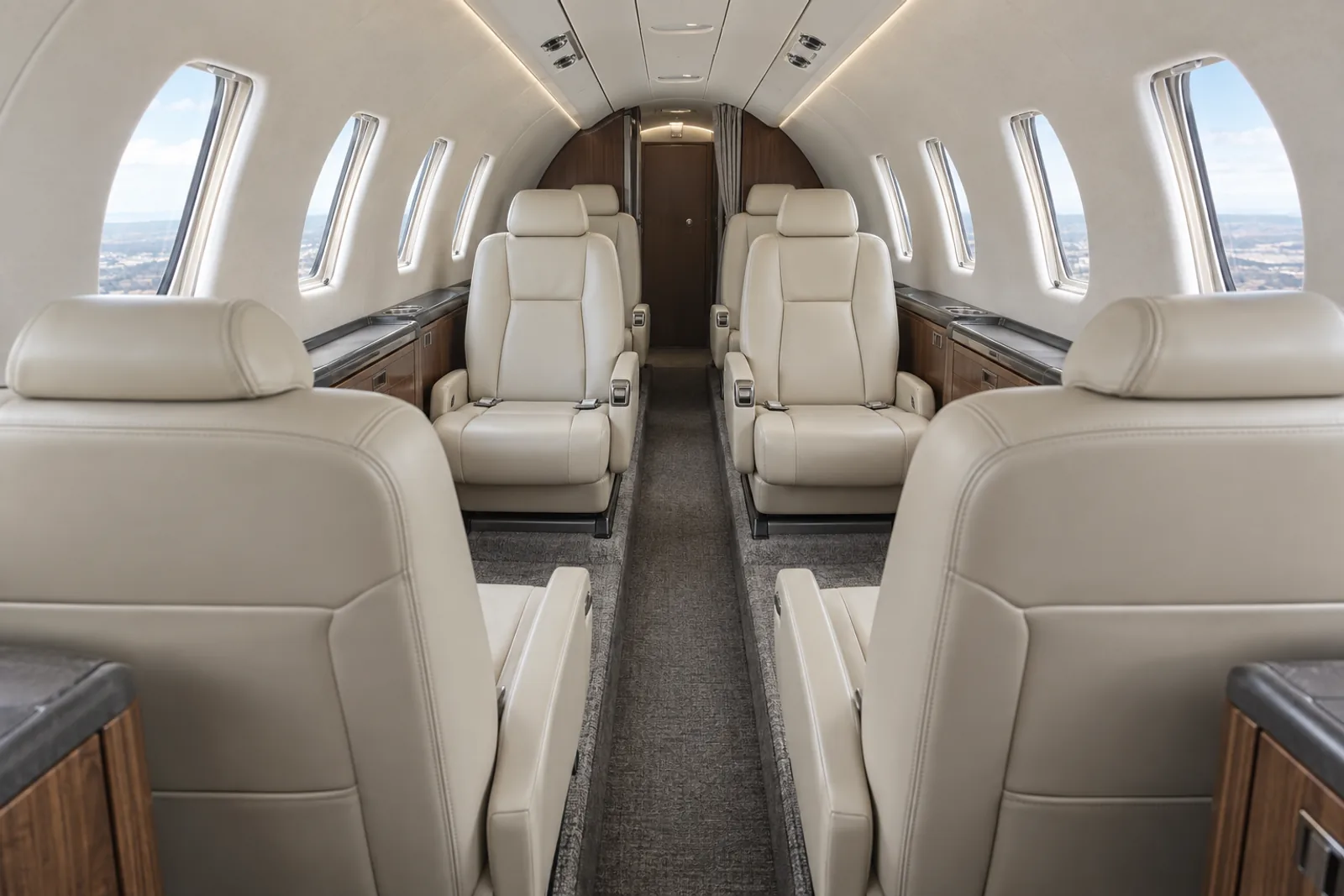 Representative Citation CJ2+ cabin with six main chairs, a central club and aft pair